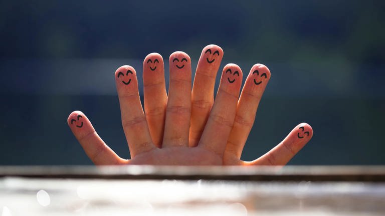 Happy group of finger smileys on the beach 5 model released