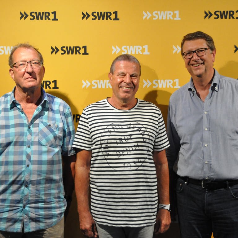Die SWR1 Hitparaden-Macher Jürgen Rathfelder, Hans-Peter Archner und Christoph Mohr