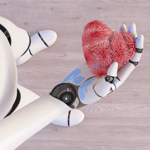 Roboter hält Herz in der Hand