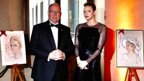 Prince Albert of Monaco and his wife at the Palazzo Vecchio for the gala dinner for the 160th anniversary of the Monegasque consulate in Florence, as he receives a portrait of his mother Grace Kelly from Nano Campeggi's widow Editorial Usage Only Florence, Italy, Ap