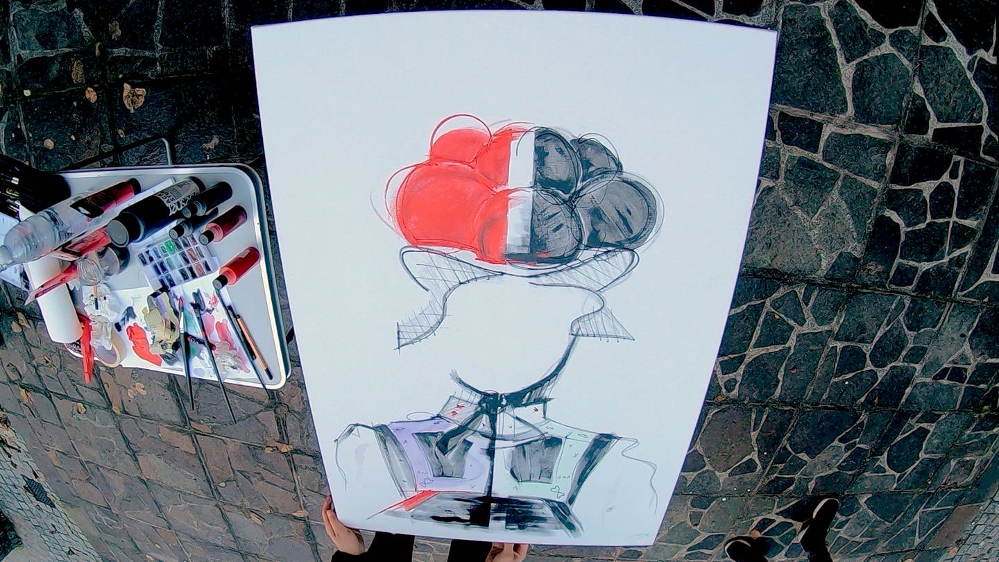 Das Kunswerk zeigt eine Frau die einen zwei geteilten Bollenhut auf hat. (Foto: SWR)