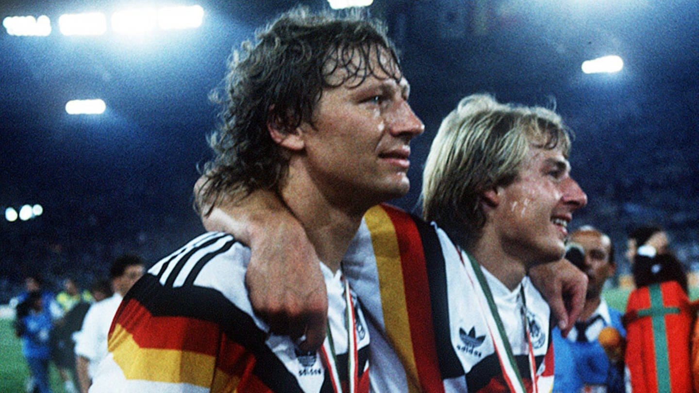Guido Buchwald und Jürgen Klinsmann 1990 als Weltmeister
