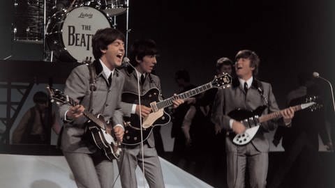 Die Beatles bei einem ihrer ersten Auftritte, 1962.