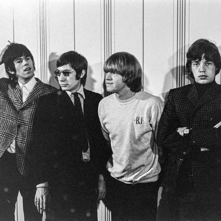 The Rolling Stones posieren nach einer Pressekonferenz in Stockholm 1965. Von links: Keith Richards, Charlie Watts, Brian Jones, Mick Jagger und Bill Wyman. (Foto: picture-alliance / Reportdienste, picture alliance / BONNIERARKIVET | Owe Wallin/KB/TT)