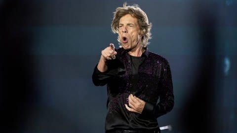 Mick Jagger of the Rolling Stones performs onstage at the Groupama stadium, outside Lyon, central France, during a concert as part of their "Sixty" European tour, Tuesday, July 19, 2022.