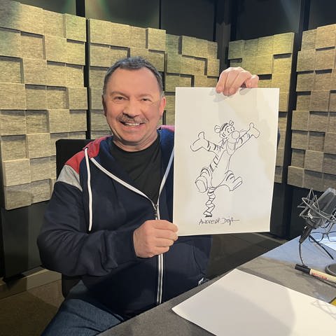 Disney Zeichner Andreas Deja zeichnet den Tigger von Winnie Pooh. (Foto: SWR)