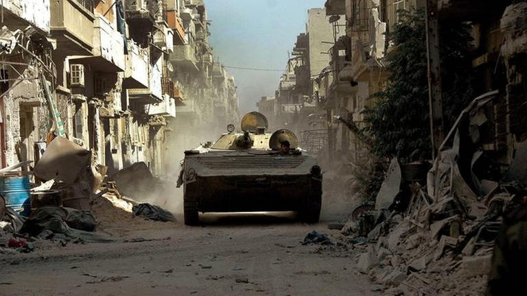 Zerstörungen in syrischer Stadt Homs (Foto: picture-alliance / dpa, picture-alliance / dpa - Stringer)