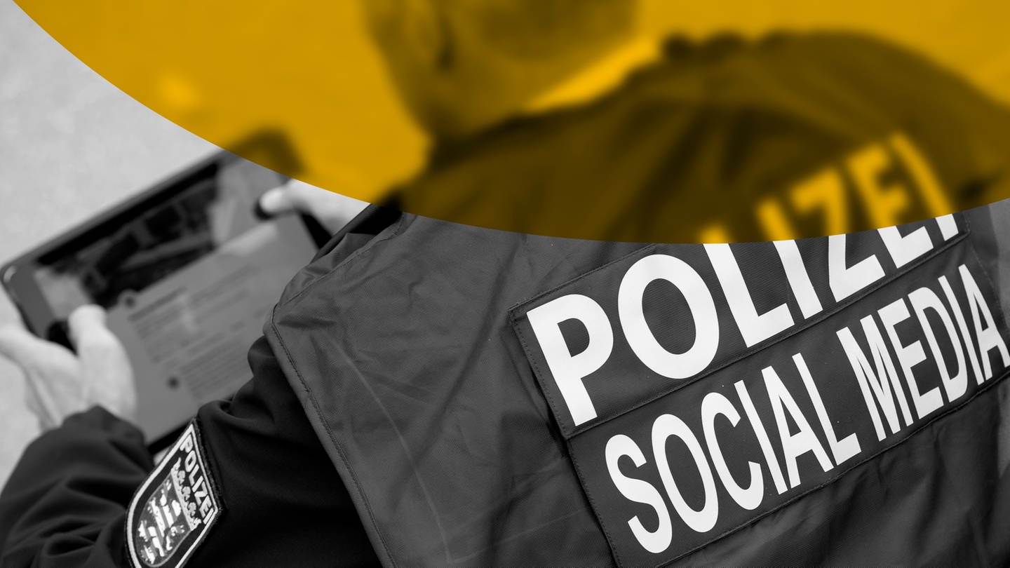 Social Media-Polizist bedient ein Tablet (Foto: Pressestelle, picture alliance / dpa | Swen Pförtner)