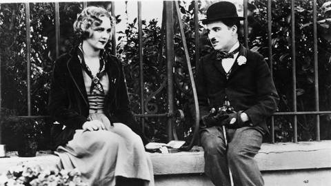 Charlie Chaplin in "Lichter der Grossstadt" (Foto: picture-alliance / Reportdienste, picture-alliance / akg-images | akg-images)