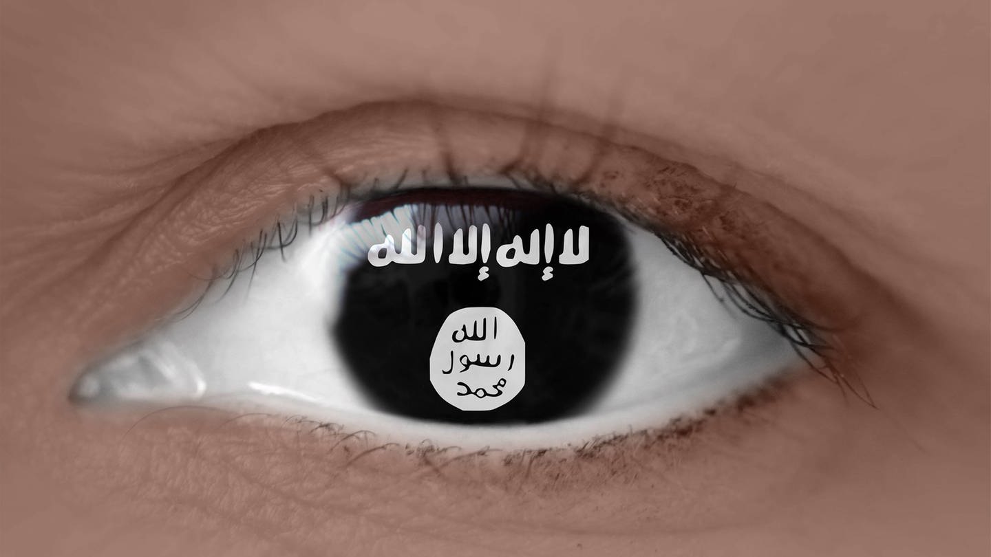 Symbolbild - Auge mit Flagge der ISIS (Foto: IMAGO, Ralph Peters)