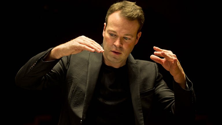 Dirigent David Reiland (Foto: Pressestelle, Jean-Baptiste Millot)