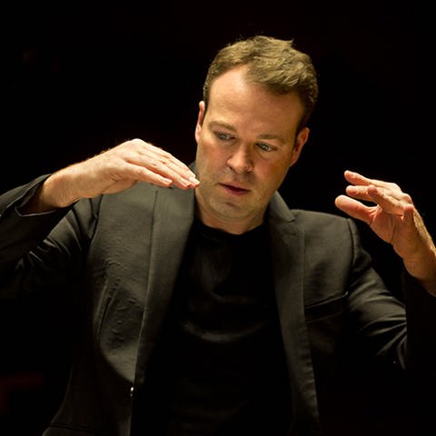 Dirigent David Reiland (Foto: Pressestelle, Jean-Baptiste Millot)