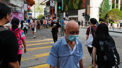 Menschen in China tragen wieder Masken (Foto: IMAGO, IMAGO / ZUMA Wire)