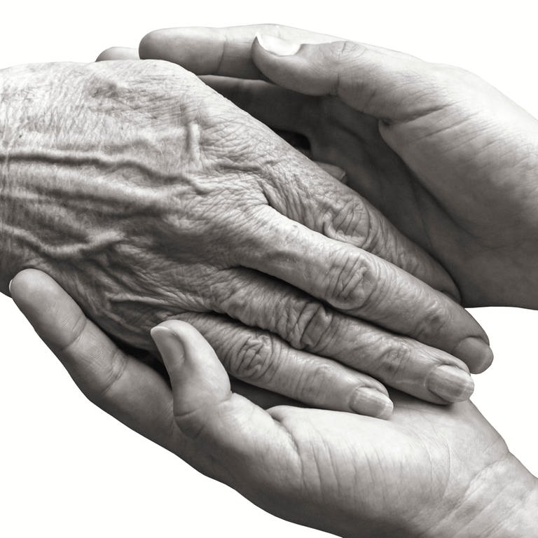 Junge Hände halten eine ältere Hand (Foto: IMAGO, IMAGO / Panthermedia)