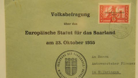 Briefumschlag. Aufschrift: Volksbefragung über das Europäische Statut für das Saarland am 23. Oktober 1955 (Foto: imago images, imago images / Becker&Bredel)