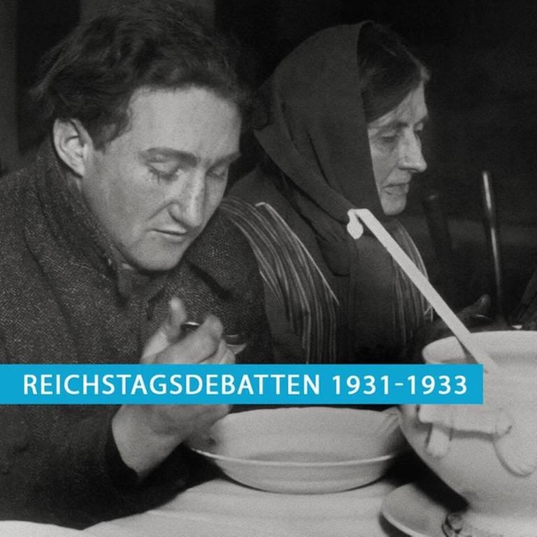 Speisung von Arbeitslosen und Bedürftigen aus privaten Mitteln in einer Wärmehalle in Berlin-Neukölln im Januar 1931. Auch im Reichstag wird das wachsende Elend in der Bevölkerung diskutiert. (Foto: picture-alliance / dpa, picture-alliance / dpa -)