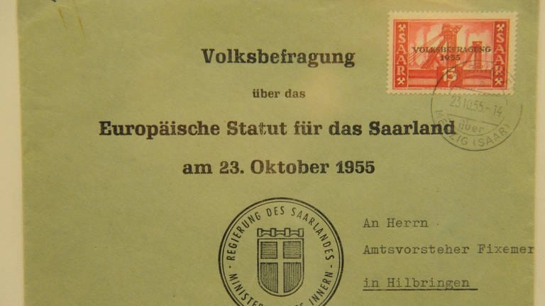 Briefumschlag. Aufschrift: Volksbefragung über das Europäische Statut für das Saarland am 23. Oktober 1955 (Foto: IMAGO, imago images / Becker&Bredel)