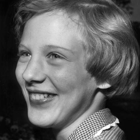 Kinderfoto von Königin Margrethe von Dänemark: Sie ist noch eine junge Prinzessin und lächelt.