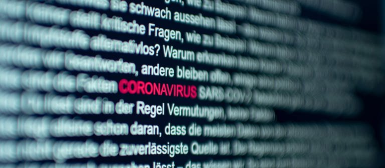 Text mit dem Begriff Coronavirus auf Computer Bildschirm (Foto: Getty Images, pxel66)