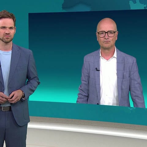 Nachrichtensprecher Georg Bruder mit Wetterreporter Karsten Schwanke