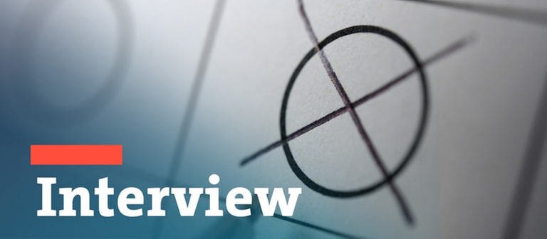 Ein Kreuz im Kreis auf einem Stimmzettel & Typo "Interview" (Foto: dpa Bildfunk, picture alliance/Roland Schlager/APA)