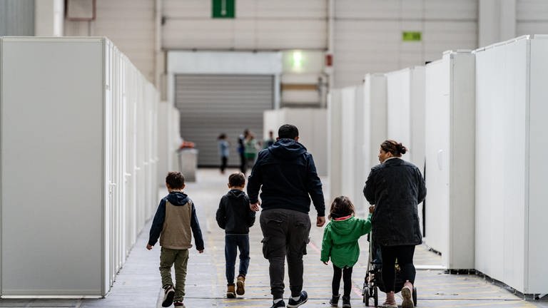 Flüchtlinge in einer Unterkunft (Foto: picture-alliance / Reportdienste, epd-bild | Peter Juelich)