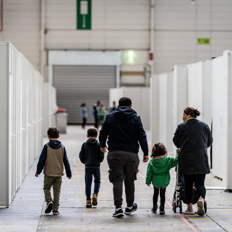 Flüchtlinge in einer Unterkunft (Foto: picture-alliance / Reportdienste, epd-bild | Peter Juelich)