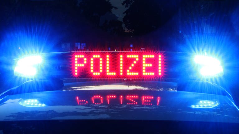 Ein Polizeiwagen, nachts im Einsatz. (Foto: SWR, Daniel Brusch)