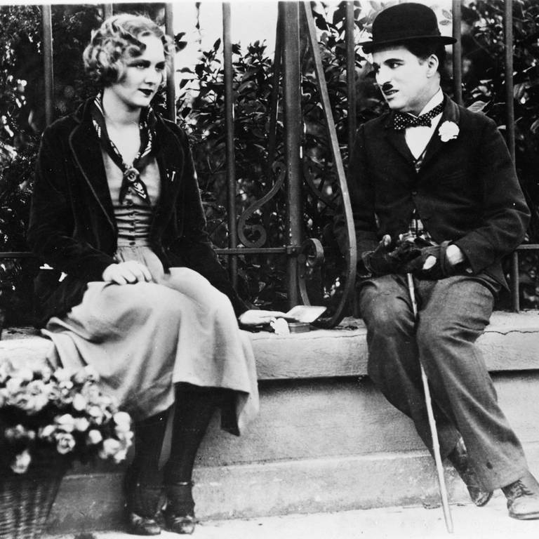 Charlie Chaplin in "Lichter der Grossstadt" (Foto: picture-alliance / Reportdienste, picture-alliance / akg-images | akg-images)