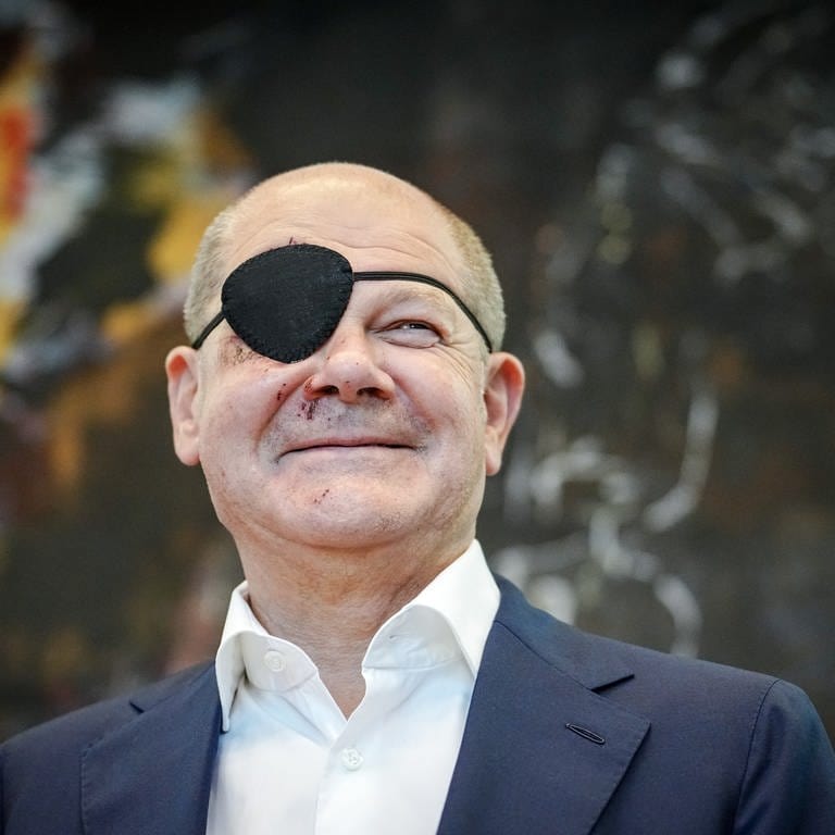Bundeskanzler Olaf Scholz nach Sturz mit Augenklappe