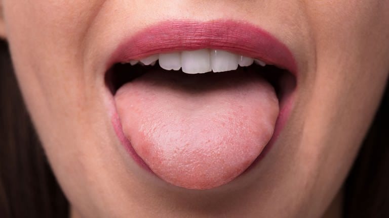 Woman Showing Tongue model released, Symbolfoto,