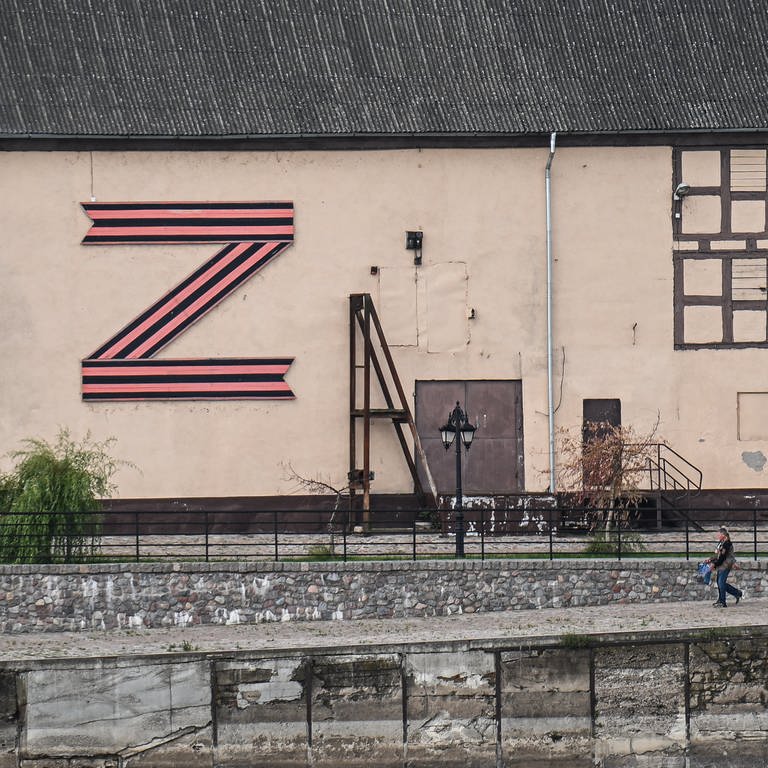 PAGEGIAI, LITHUANIA - JULY 10: A man walks past a giant letter Z