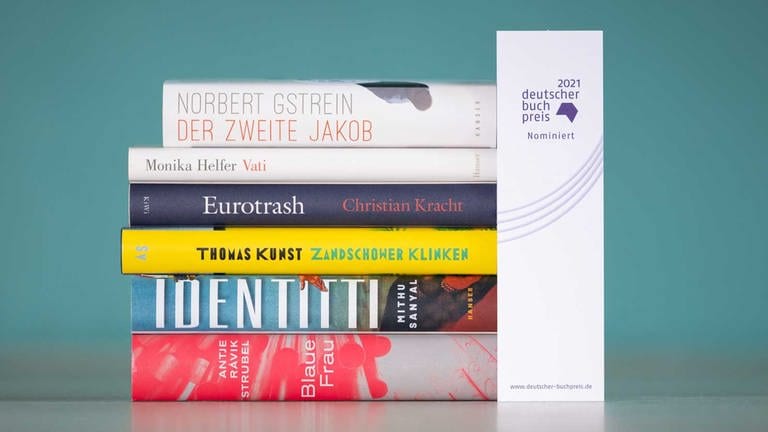 Die sechs Bücher auf der Shortlist zum Deutschen Buchpreis 2021 (Foto: Pressestelle, Börsenverein des Deutschen Buchhandels)