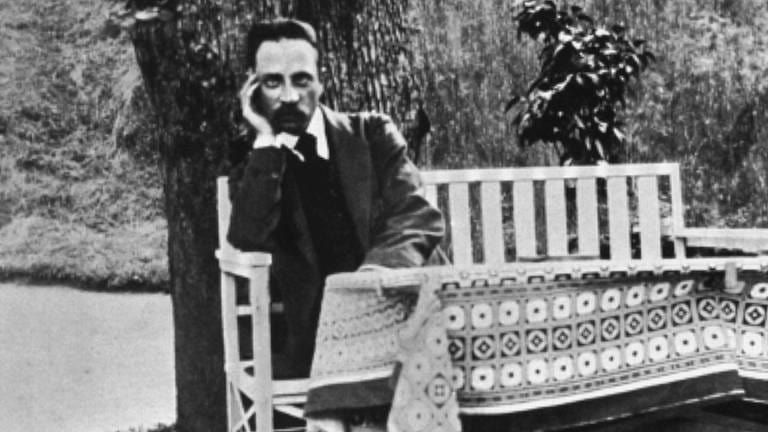 Rainer M. Rilke auf GartenbankFoto 1913 (Foto: picture-alliance / Reportdienste, picture alliance / akg-images)