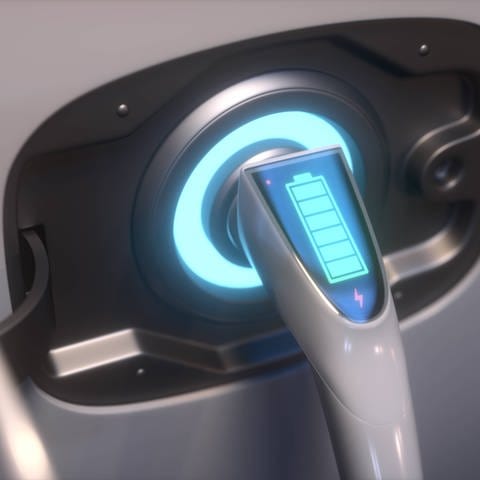 Ladestecker eines E-Autos mit einer Batterieanzeige. (Foto: IMAGO, /Science Photo Library)
