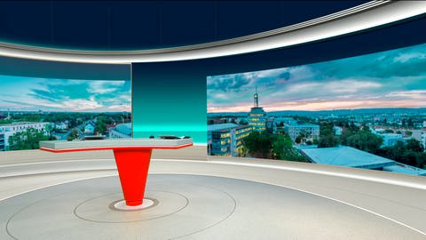 Ein roter Tisch steht vor zwei Panoramawänden im neuen Studio in Mainz von SWR Aktuell Rheinland-Pfalz (Foto: SWR)