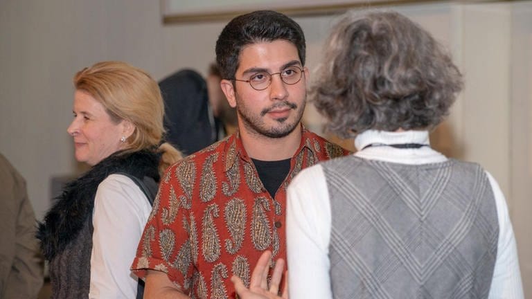 Unterhaltung zwischen dem Referenten Ali Can und einem Gast (Foto: SWR, SWR)