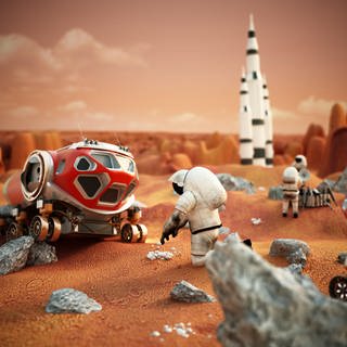 Die fiktive Szene mit Fahrzeugen und Astronauten zeigt eine bemannte Marsmission (Foto: picture-alliance / Reportdienste, picture alliance / Zoonar | Cigdem Simsek)