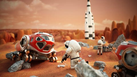 Die fiktive Szene mit Fahrzeugen und Astronauten zeigt eine bemannte Marsmission (Foto: picture-alliance / Reportdienste, picture alliance / Zoonar | Cigdem Simsek)