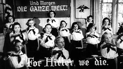 Propaganda-Bilder vermitteln oft den Eindruck, praktisch alle Jugendlichen seien mit Begeisterung Hitlerjunge oder beim Bund Deutscher Mädel gewesen (Foto: IMAGO, IMAGO / Everett Collection)