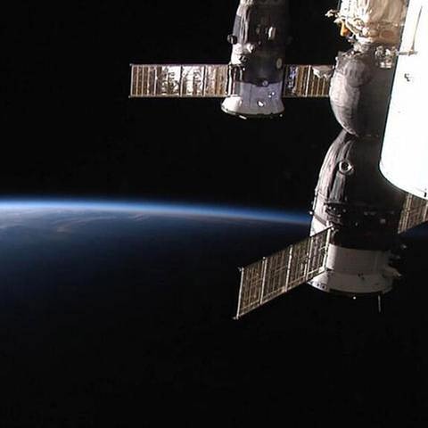 Die Sojus TMA 13M-Kapsel am 29. Mai 2014 an der ISS angedockt. Alexander Gerst ist auf der ISS angetroffen (Foto: picture-alliance / dpa, ESA/NASA - picture-alliance / dpa - ESA/NASA)