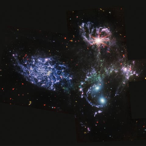 Aufnahme des NASA Webb Teleskops, die ein Cluster von Millionen jungen und frisch geborenen Sternen zeigt  (Foto: IMAGO, IMAGO / ZUMA Wire)