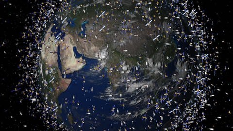 Weltraummüll früherer Weltraummissionen kreist neben intakten Satelliten um die Erde. (Foto: dpa Bildfunk, picture alliance/dpa/ESA)