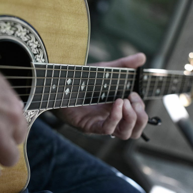 Gitarrenspieler (Foto: IMAGO, IMAGO / Cavan Images)