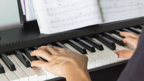 Klavierspieler, tags: Absolutes Gehör, Musikalität