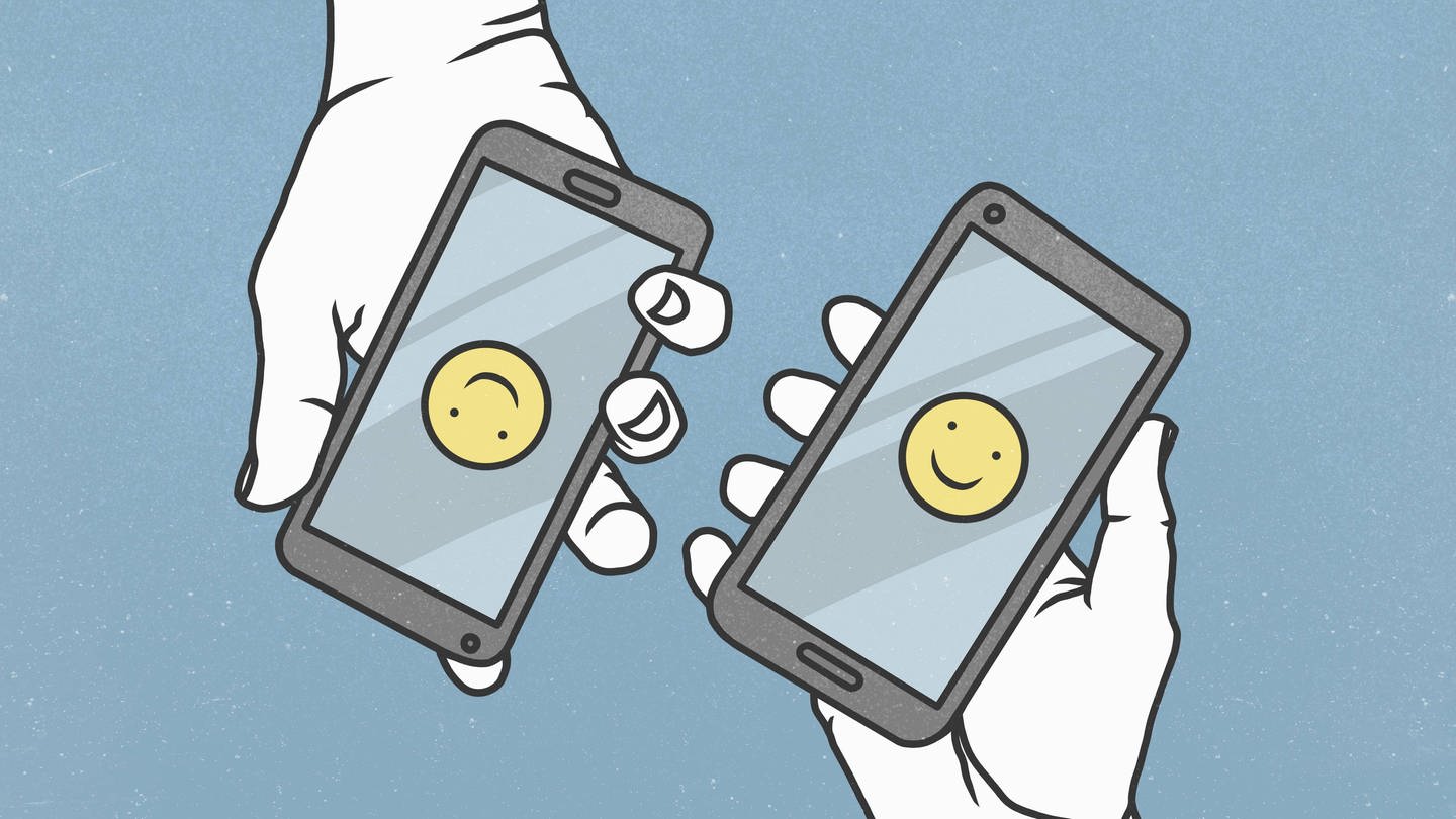 Lächelnder Emoji auf einem Smartphone. (Foto: IMAGO, IMAGO / fStop Images)