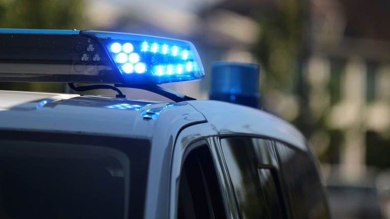 Symbolbild  - Polizeiauto und Blaulicht
