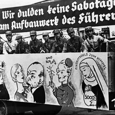 Karikatur zeigt: "Bitte nicht sterilisieren; ein Jude, der mit einem arischen Mädchen Liebe macht; Saxo-Borussia