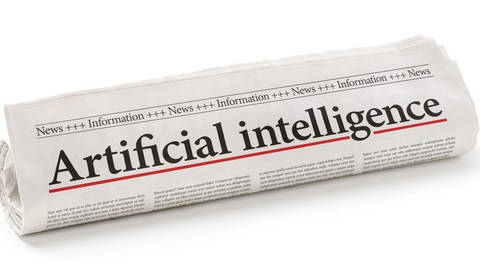 Zeitung mit der Headline "Artificial Intelligence": Das Aufspüren relevanter Ereignisse ist einer der wichtigsten Anwendungsbereiche von KI im Journalismus 